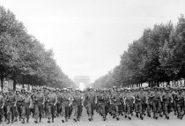 American_troops_march_down_the_Champs_Elysees_crop
